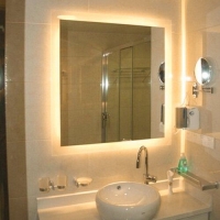 LED стрічка 12В ST-12-2835-120-WW-65 Білий Теплий 2800-3200К IP65 8мм